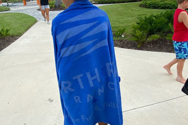  Sporting the North River Ranch towel 